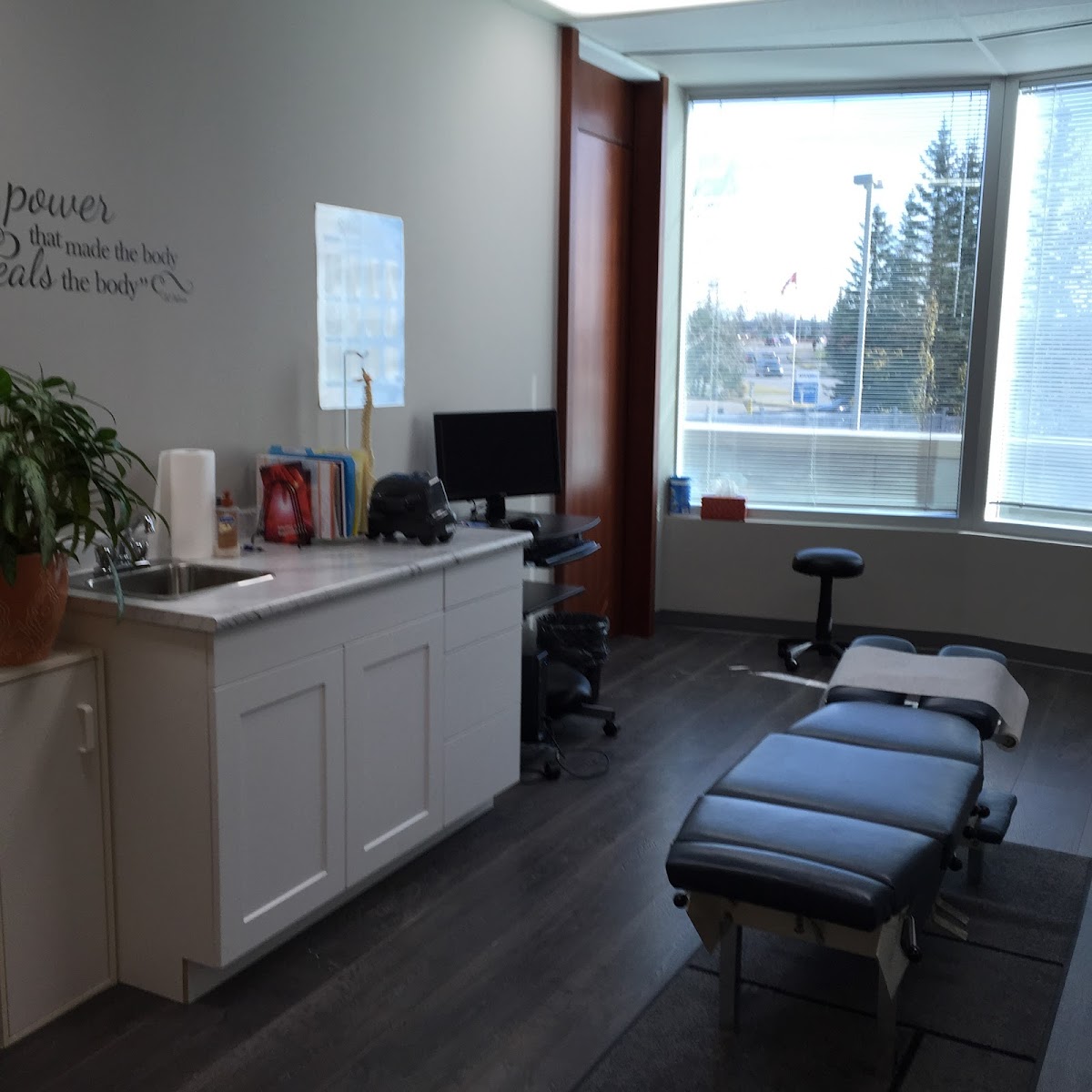 ChiroMotion - Optimum Wellness Centres - Crowfoot